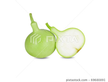 whole and half cut fresh green calabash on white background 69680891