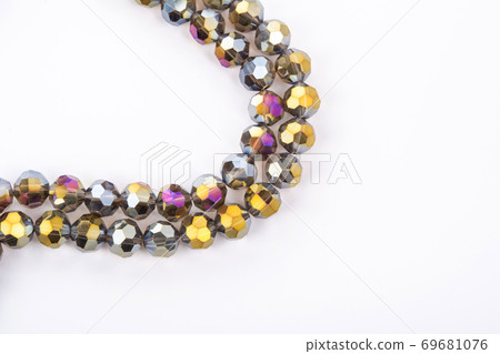 Beautiful Glass Sparkle Crystal Isoalted Beads on white background Beautiful Glass Sparkle Crystal Isoalted Beads on white background 69681076