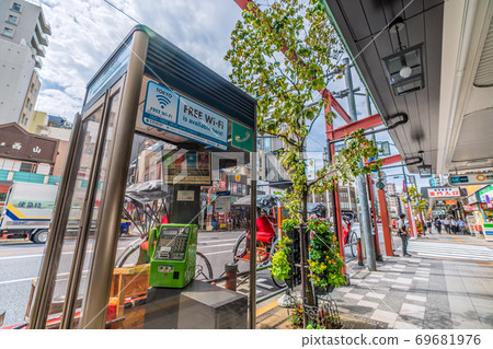 Tokyo cityscape of Japan Telephone booth and FREE Wi-Fi in front of Tokyo Metro Asakusa Station (doorway) Tokyo cityscape of Japan Telephone booth and FREE Wi-Fi in front of Tokyo Metro Asakusa Station (doorway) 69681976