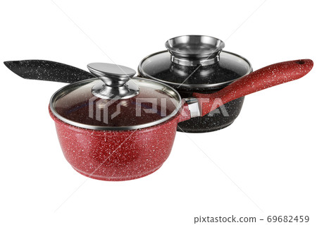 two enameled dippers, red and black, with glass lids, on a white background two enameled dippers, red and black, with glass lids, on a white background 69682459