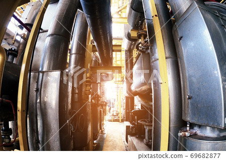 Industry plant concept,Equipment, cables and piping as found inside of a modern industrial power plant or offshore platform Industry plant concept,Equipment, cables and piping as found inside of a modern industrial power plant or offshore platform 69682877