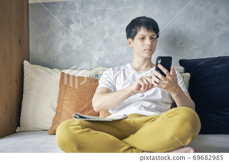 Male smartphone lifestyle Male smartphone lifestyle 69682985