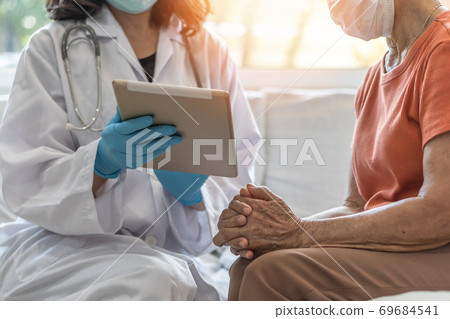 Elderly senior adult patient (older person) having geriatric doctor consulting 69684541