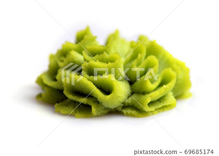 Wasabi portion on white background. Wasabi portion on white background. 69685174