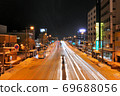 Night view of Route 7 on a heavy snowy day in Aomori City ② 69688056