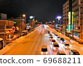 Night view of Route 7 on a heavy snowy day in Aomori City ④ 69688211
