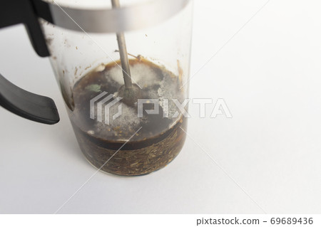 Mold in tea pot on white background 69689436