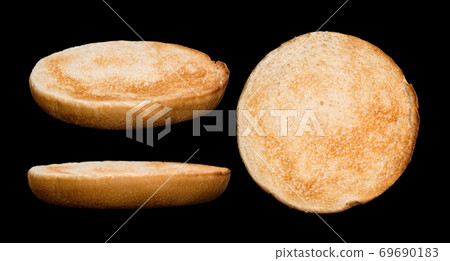 Set of burger bun isolated on black background. Different sides and parts Set of burger bun isolated on black background. Different sides and parts 69690183