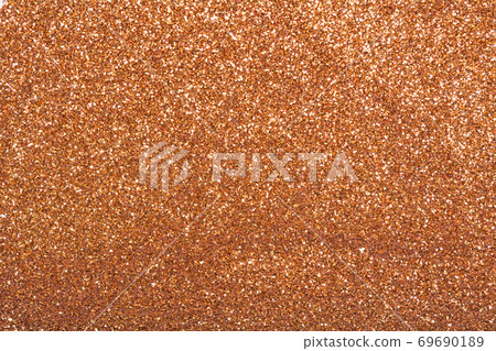 The texture of dry shiny glitter. Bronze bright sparkles. The texture of dry shiny glitter. Bronze bright sparkles. 69690189