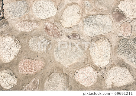 Texture of a stone wall. Texture of a stone wall. 69691211