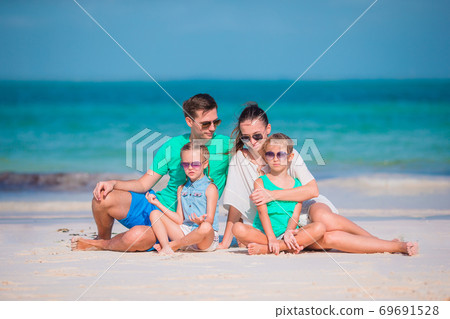 Young family on vacation have a lot of fun Young family on vacation have a lot of fun 69691528