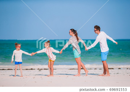 Young family on vacation have a lot of fun 69691553