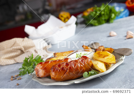 sausages with potato sausages with potato 69692371