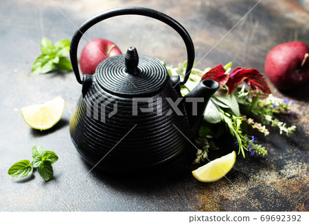 teapot and herb teapot and herb 69692392