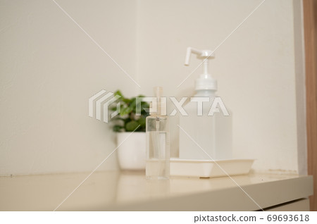 Corona measures Alcohol sterilization at the front door 69693618