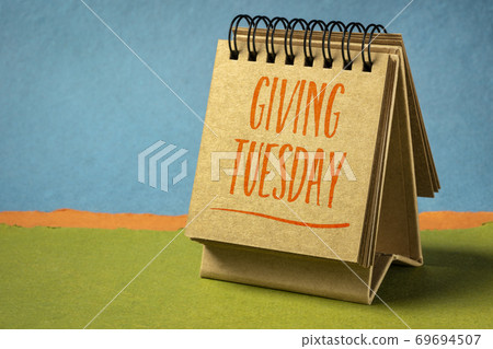 Giving Tuesday handwriting in an art sketchbook Giving Tuesday handwriting in an art sketchbook 69694507