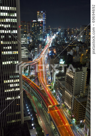 The Metropolitan Expressway at night weaving a group of buildings The Metropolitan Expressway at night weaving a group of buildings 69694692
