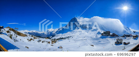 Panoramic view from Kleine Scheidegg station, along the railway from Interlaken to Jungfraujoch (3,466 m). In daylight at Switzerland 69696297