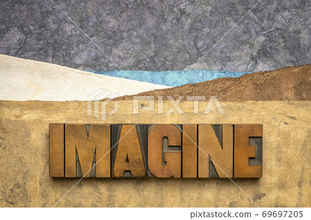 imagine concept in wood type and handmade paper 69697205