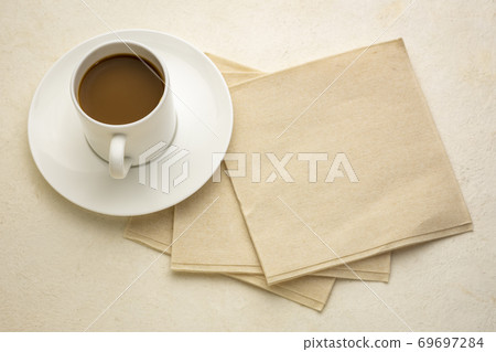 cup of espresso coffee with bamboo napkins 69697284