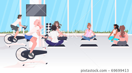 people doing physical exercises cardio training fitness workout healthy lifestyle concept 69699413