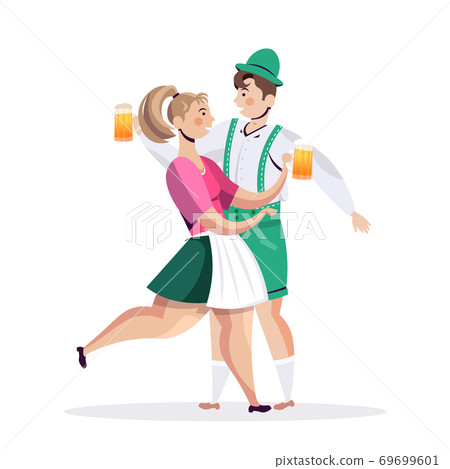couple in traditional clothes drinking beer celebrating Oktoberfest party man woman having fun 69699601
