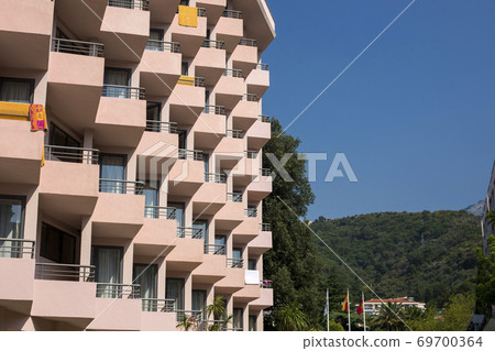 Fragment of the facade of a multi-storey residential building 69700364