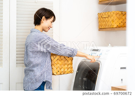 Housewives doing laundry 69700672