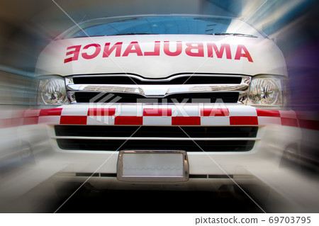 Ambulance car, front view. Emergency rescue service van with motion blurred background 69703795
