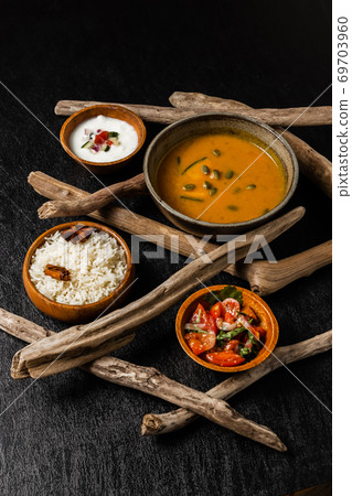 Nan and Indian curry Naan and three colors of India curry Nan and Indian curry Naan and three colors of India curry 69703960