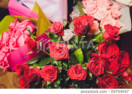 A flower bouquet with a lot of a different flowers. A flower bouquet with a lot of a different flowers. 69704097