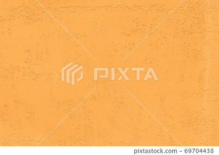Saturated orange low contrast Concrete textured background Saturated orange low contrast Concrete textured background 69704438
