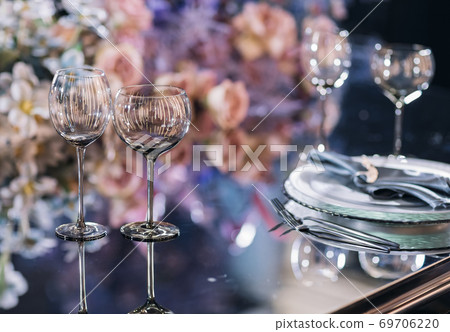 Empty glasses set in a modern restaurant Empty glasses set in a modern restaurant 69706220