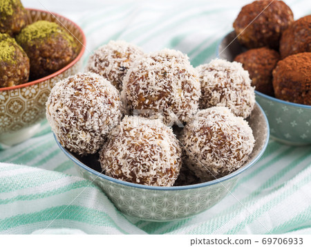 Energy protein balls with coconut flakes Energy protein balls with coconut flakes 69706933
