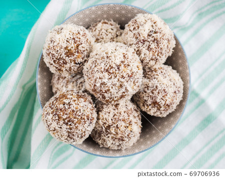 Energy protein balls with coconut flakes 69706936