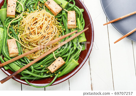 Oriental vegetable salad with pasta 69707257