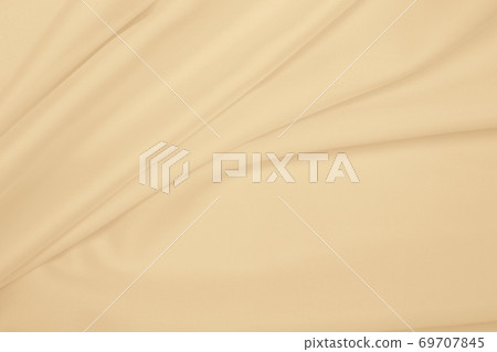 Smooth elegant golden silk or satin luxury cloth texture as wedding background. Luxurious background design. In Sepia toned. Retro style Smooth elegant golden silk or satin luxury cloth texture as wedding background. Luxurious background design. In Sepia toned. Retro style 69707845