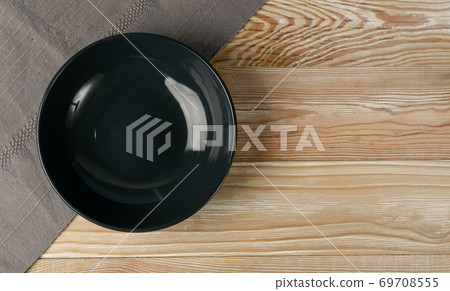Empty Plate on White Wooden Table Top View with Copy Space Empty Plate on White Wooden Table Top View with Copy Space 69708555