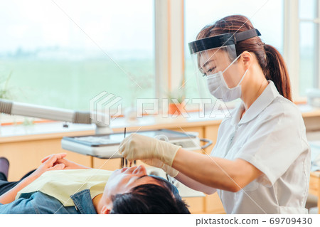 Nurse and patient 69709430