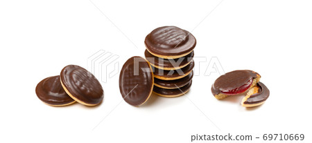 Round chocolate jaffa cake or biscuit cookie filled with natural jam 69710669
