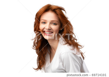 Beauty Portrait Of Red-Haired Young Lady Over White Background 69714101