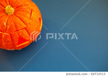 Halloween pumpkin on blue Halloween pumpkin on blue 69714513