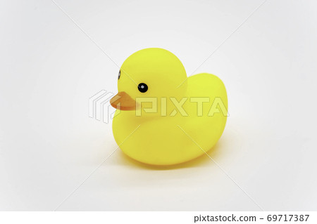 Yellow little duck doll, yellow rubber duck doll, duck bath toy for children, baby toy on white background. 69717387