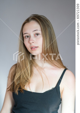 Cute Teen Girls Dressed Undressed - Portrait of a cute teenage girl wearing a black... - Stock Photo [69721309]  - PIXTA