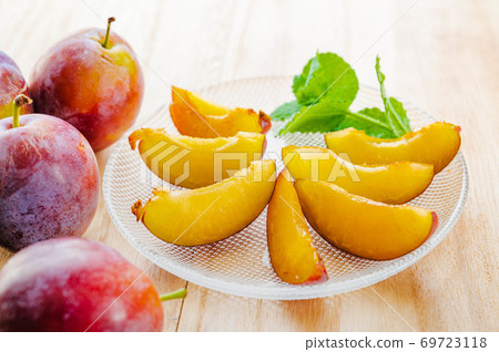 Cut raw prunes Cut raw prunes 69723118