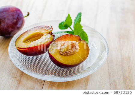 Prunes cut in half Prunes cut in half 69723120