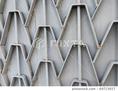 Grey metal gate pattern detail 69723657