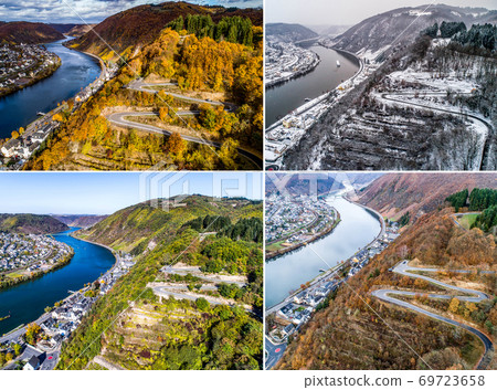 Seasons Concept summer winter fall spring Aerial view of the mosel village Brodenbach in Germany on a sunny day Seasons Concept summer winter fall spring Aerial view of the mosel village Brodenbach in Germany on a sunny day 69723658