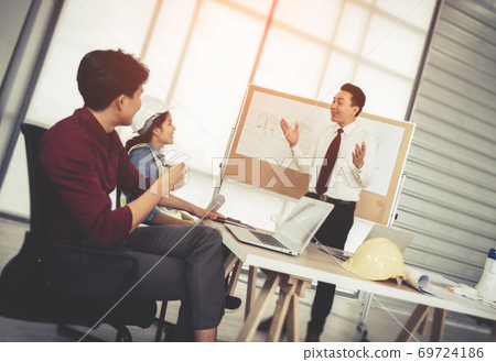 Construction Boss is congratulating his team for successfull pro Construction Boss is congratulating his team for successfull pro 69724186