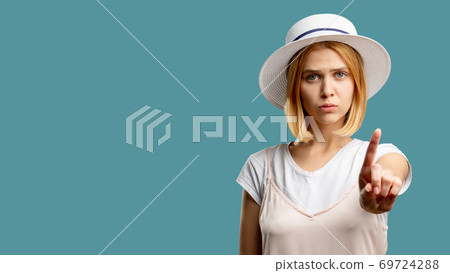 stop gesture keep silence worried woman finger 69724288